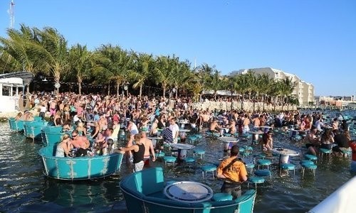 Tables in the water at Seacrets 